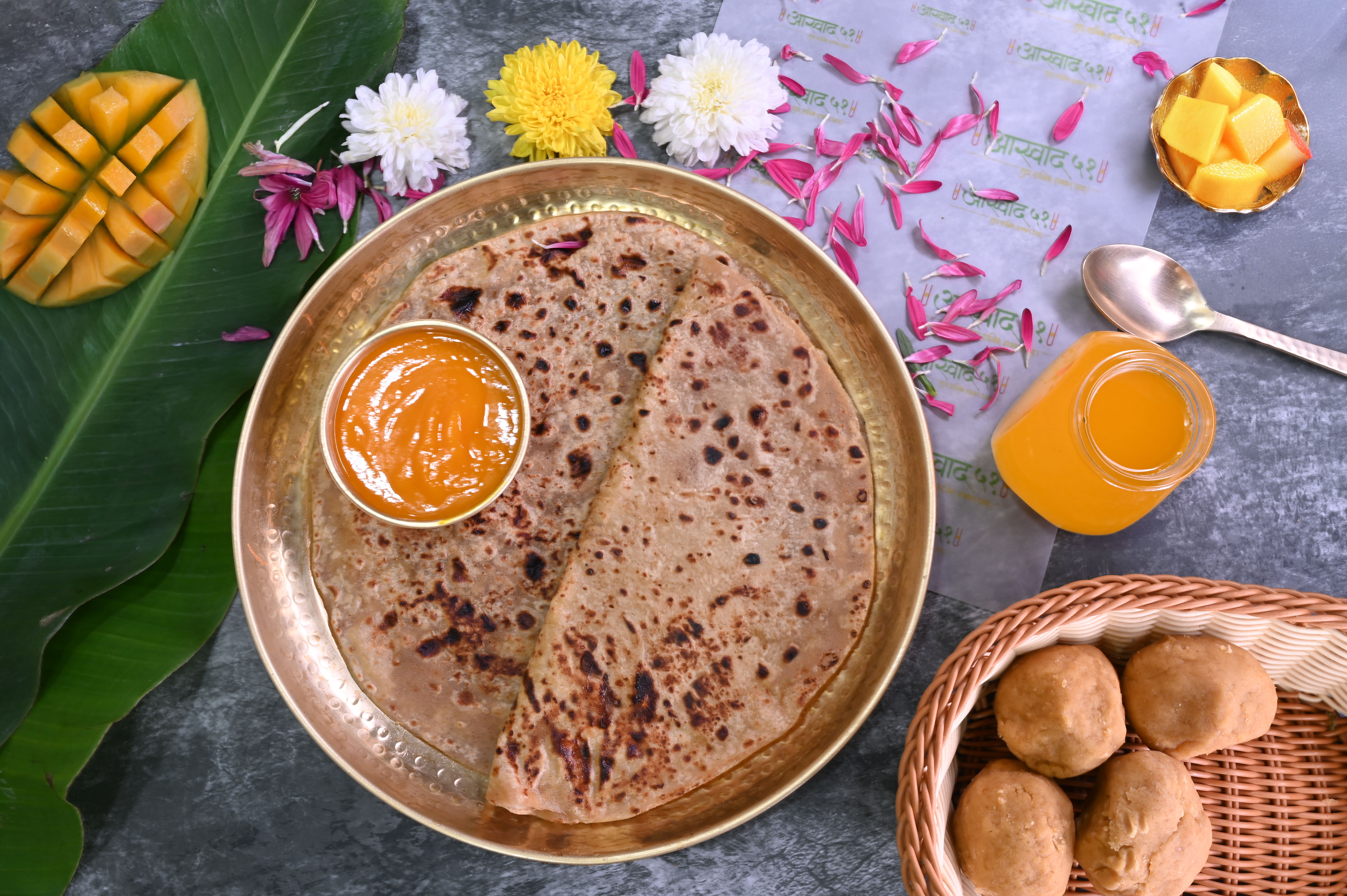 Aaswad 51 brass thali with Puran Poli, Aamras and pedha